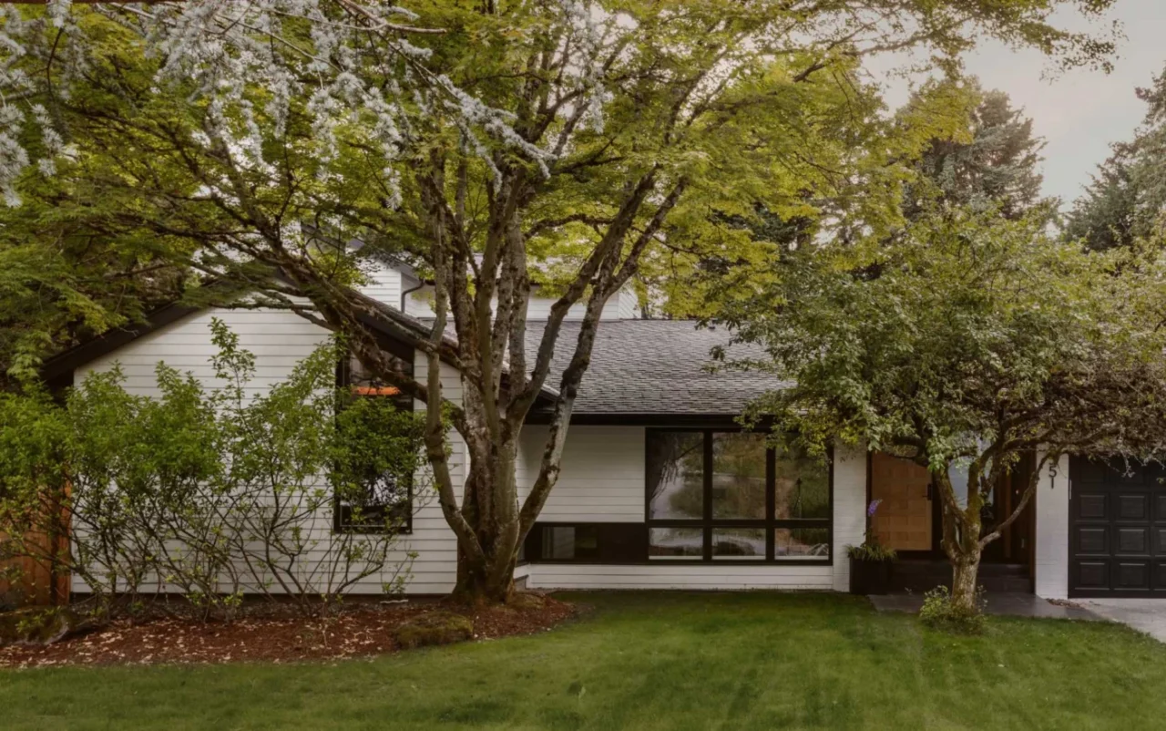 New siding, landscaping and an enlarged entry on the street facade
