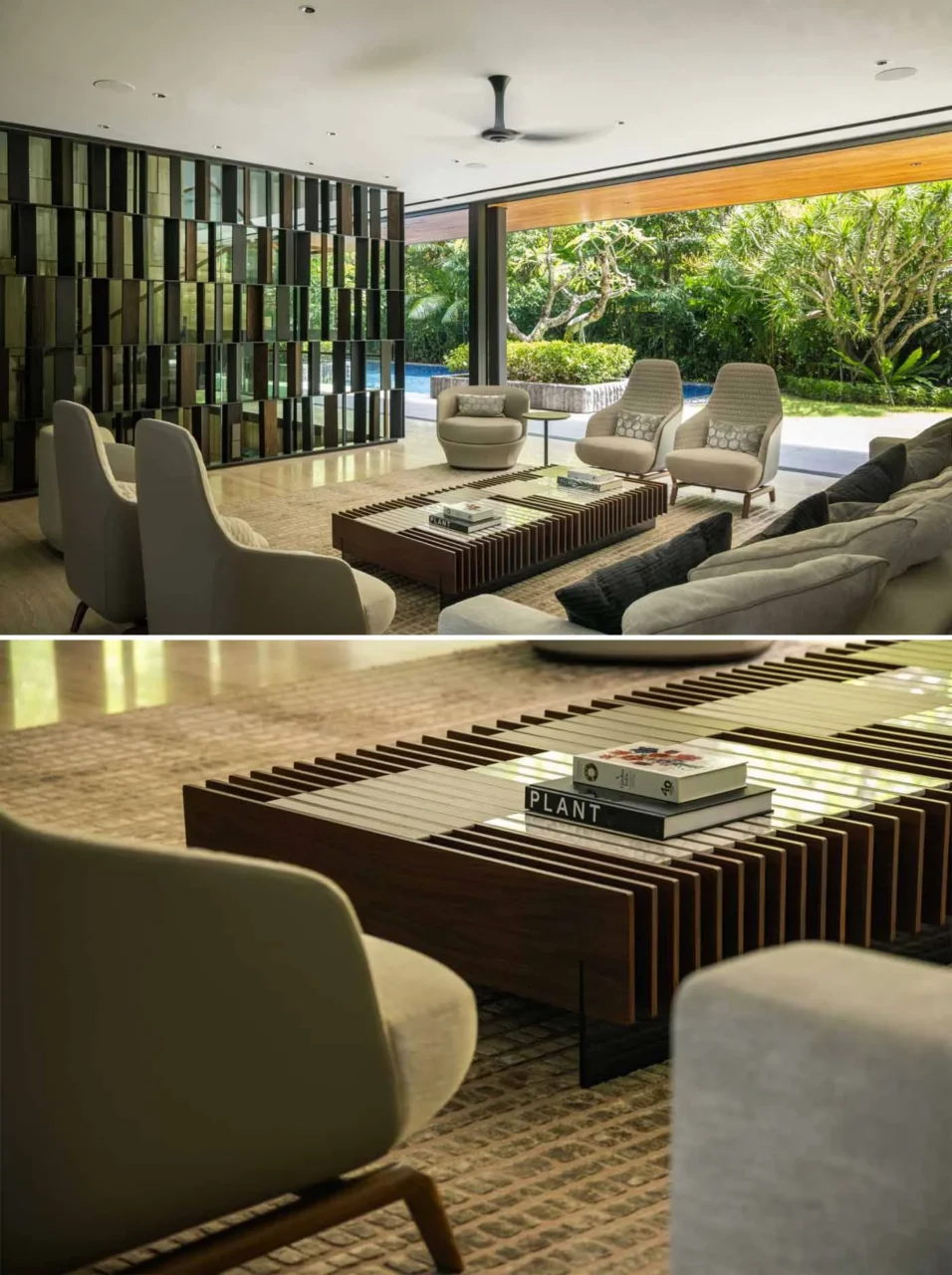 Living room with glass walls opening to the garden