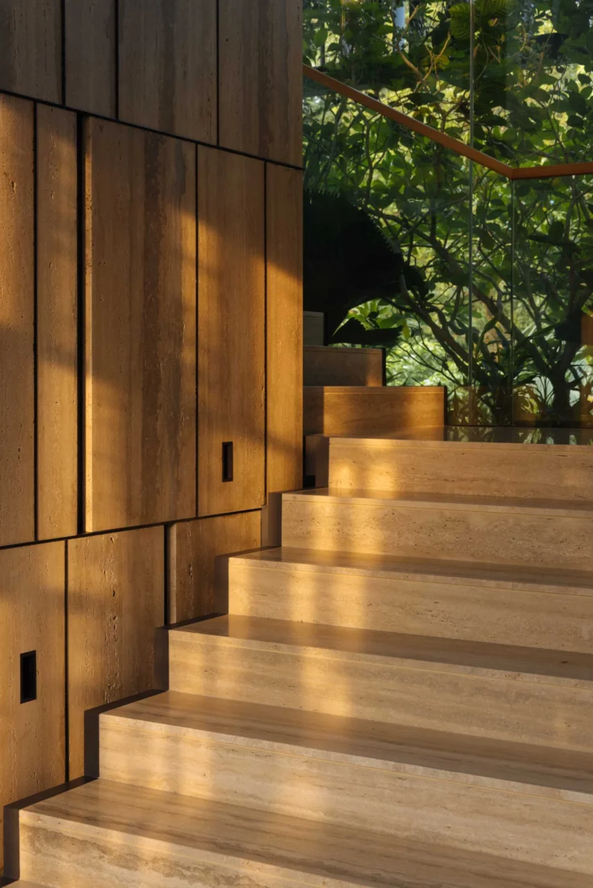 Travertine staircase inside the Singapore home