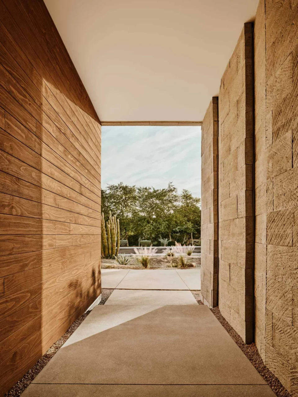 Solid travertine walls of the house set against the surrounding mountains