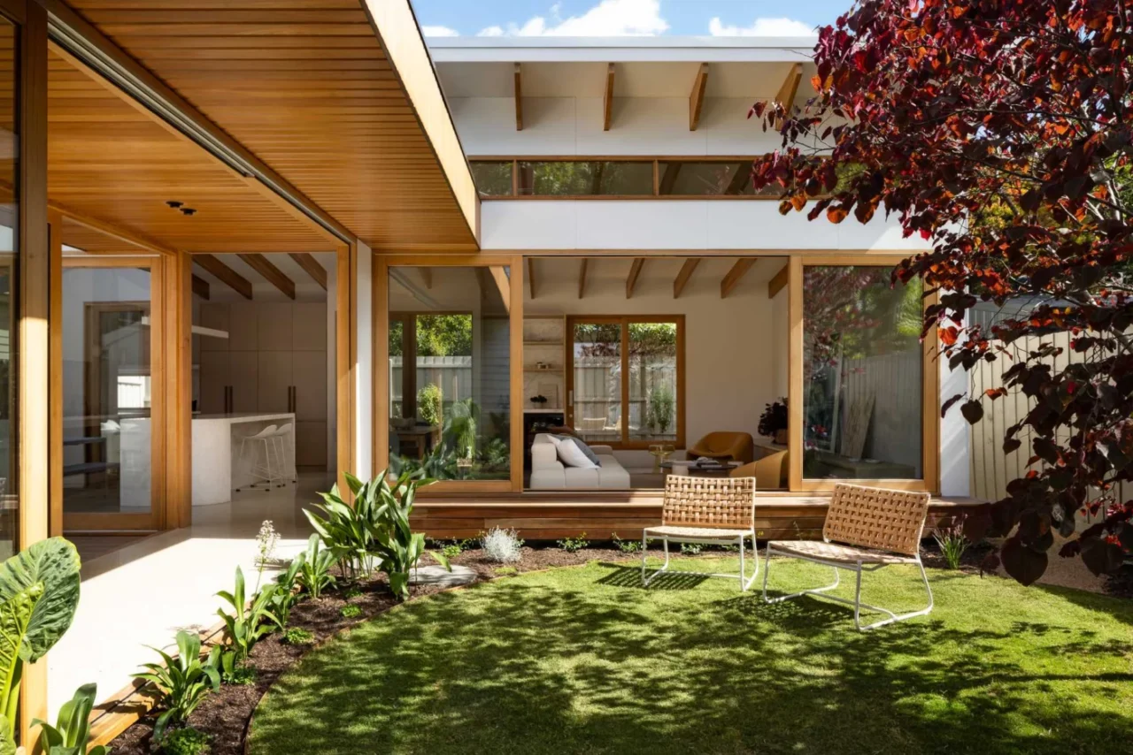 Rear addition to an Australian timber home with sliding glass doors and clerestory windows