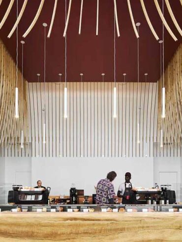 272-wood-slats-were-used-to-create-a-sculptural-element-inside-this-new-coffee-bar