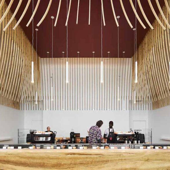 272-wood-slats-were-used-to-create-a-sculptural-element-inside-this-new-coffee-bar