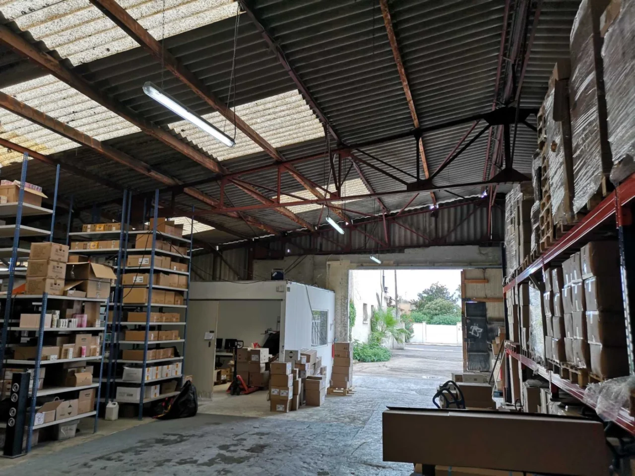 Before: shelving inside the old warehouse before it became a home