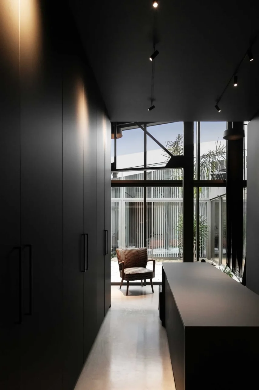 Minimalist black kitchen in the converted warehouse
