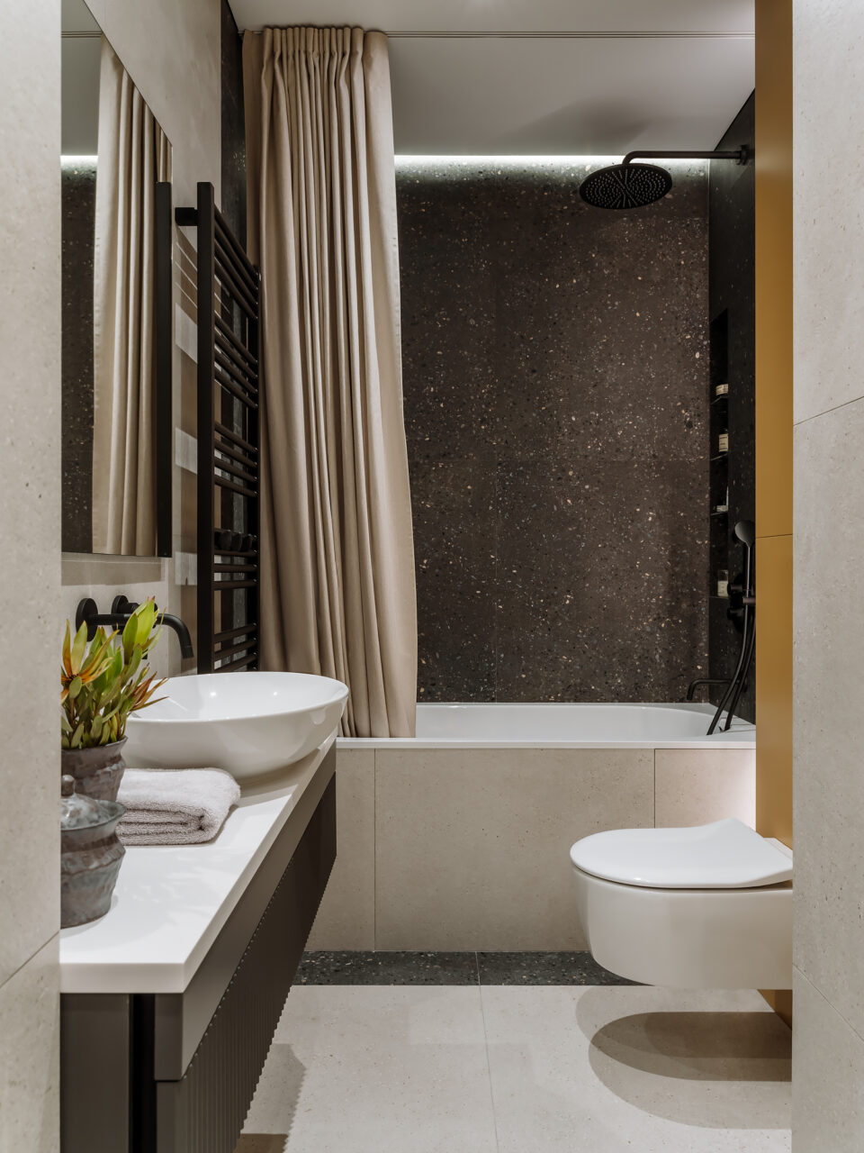 A one-bedroom 38 m2 Moscow apartment with a combined kitchen-living room and a dressing area