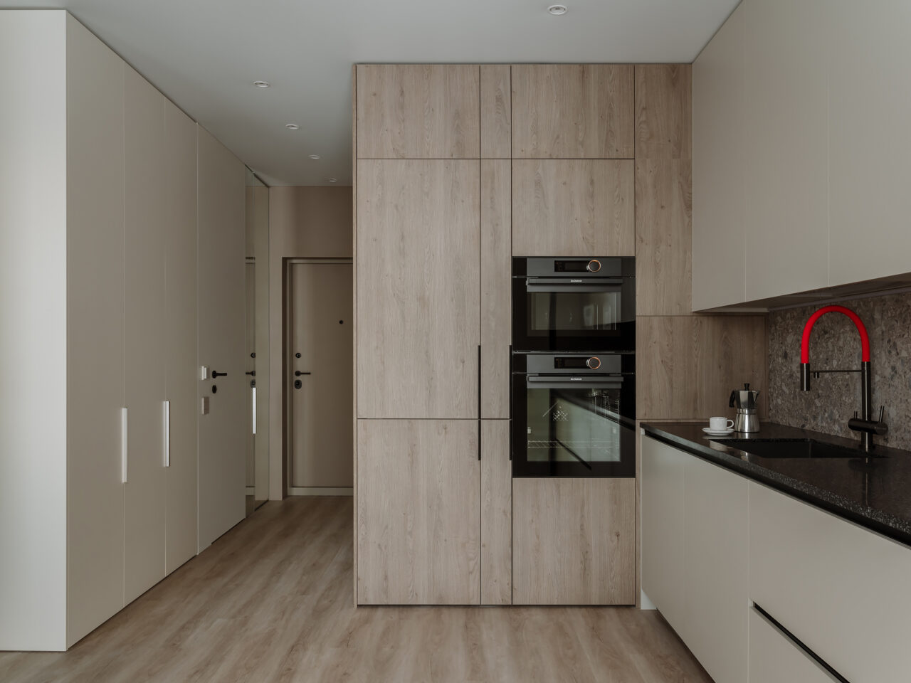 A one-bedroom 38 m2 Moscow apartment with a combined kitchen-living room and a dressing area