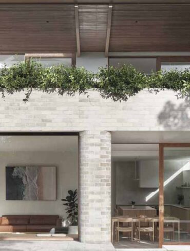a-material-palette-of-pale-brick,-concrete,-and-timber-echoes-this-home's-coastal-site