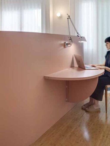 this-bed-headboard-was-designed-with-a-fold-out-desk