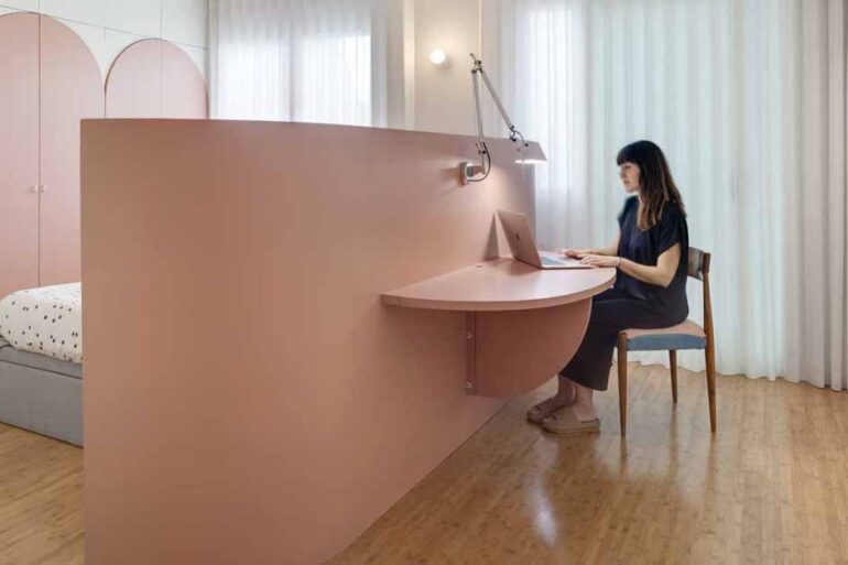 this-bed-headboard-was-designed-with-a-fold-out-desk