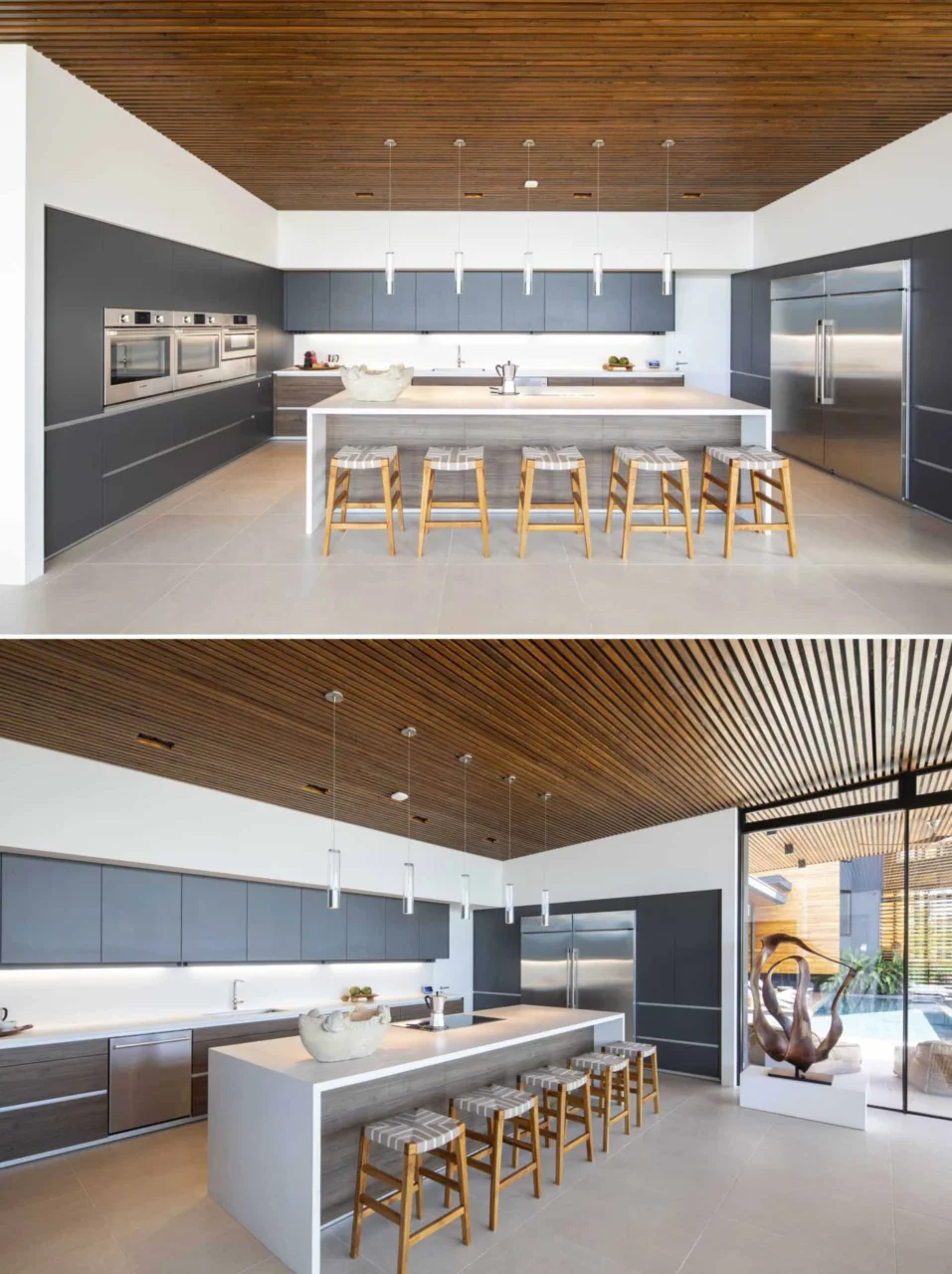 Kitchen with grey cabinets, white worktops and a large island