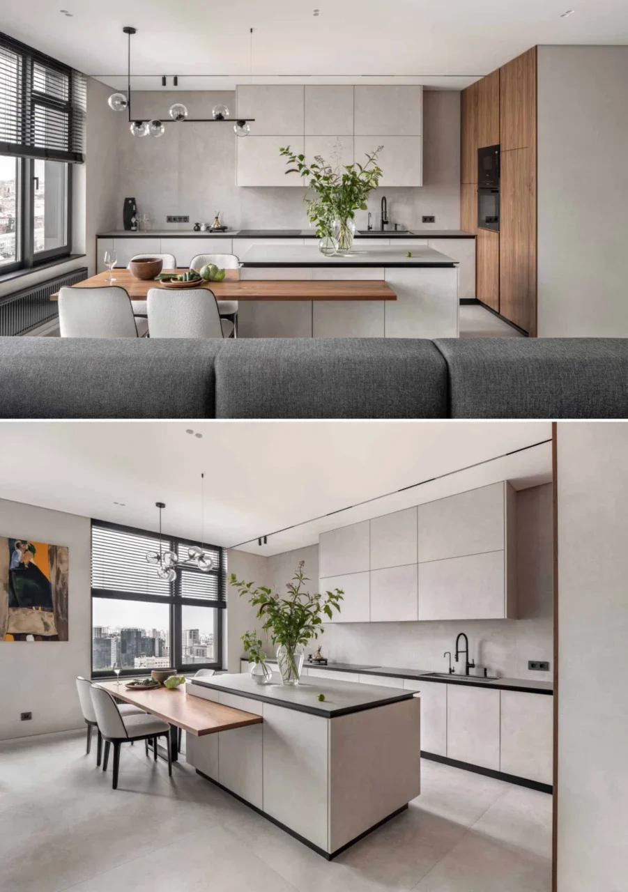 Kitchen with a central island that has a wooden table set into it