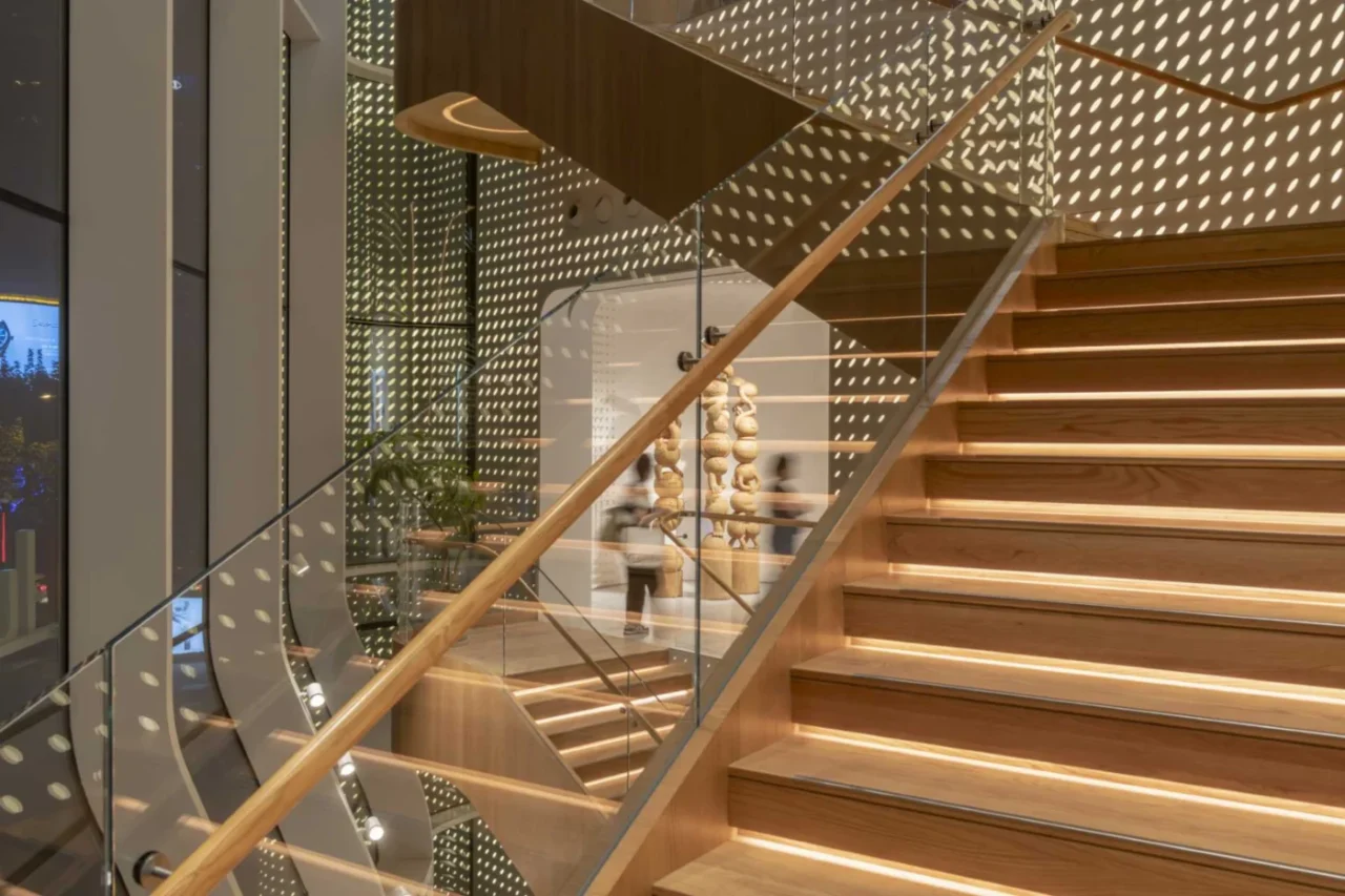 Wood stairs and balconies with hidden LED lighting