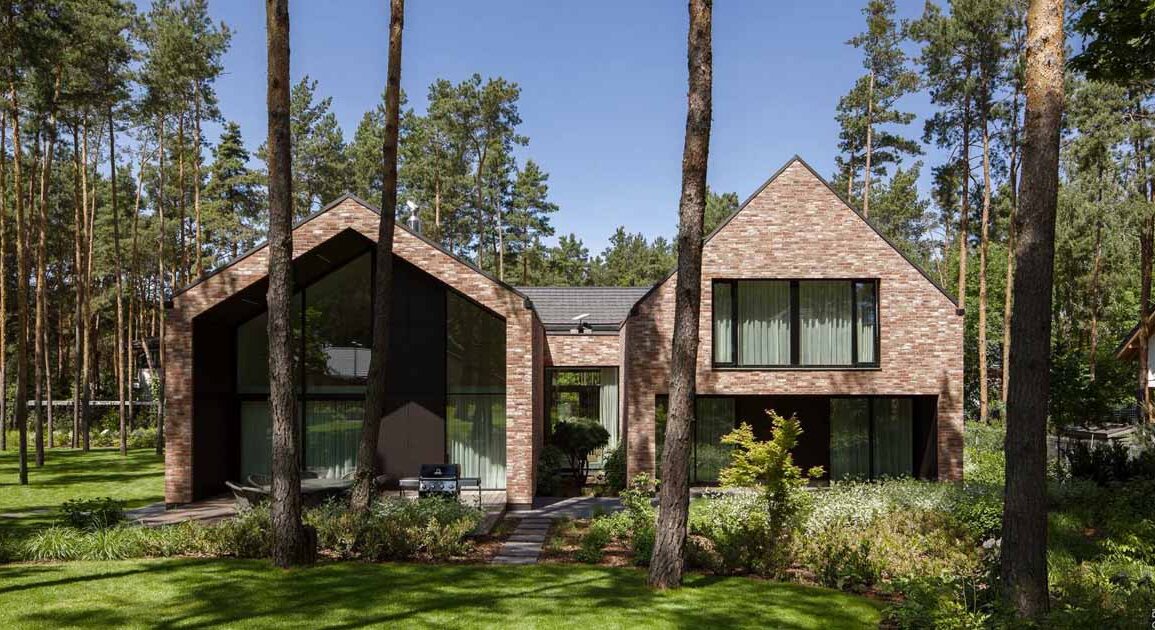 a-modern-brick-home-designed-around-the-original-placement-of-trees