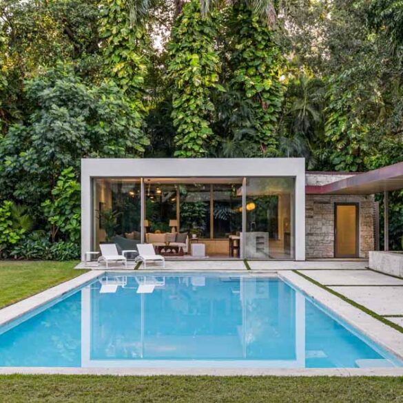 a-pool-house-and-loggia-enhance-this-lush-backyard-experience