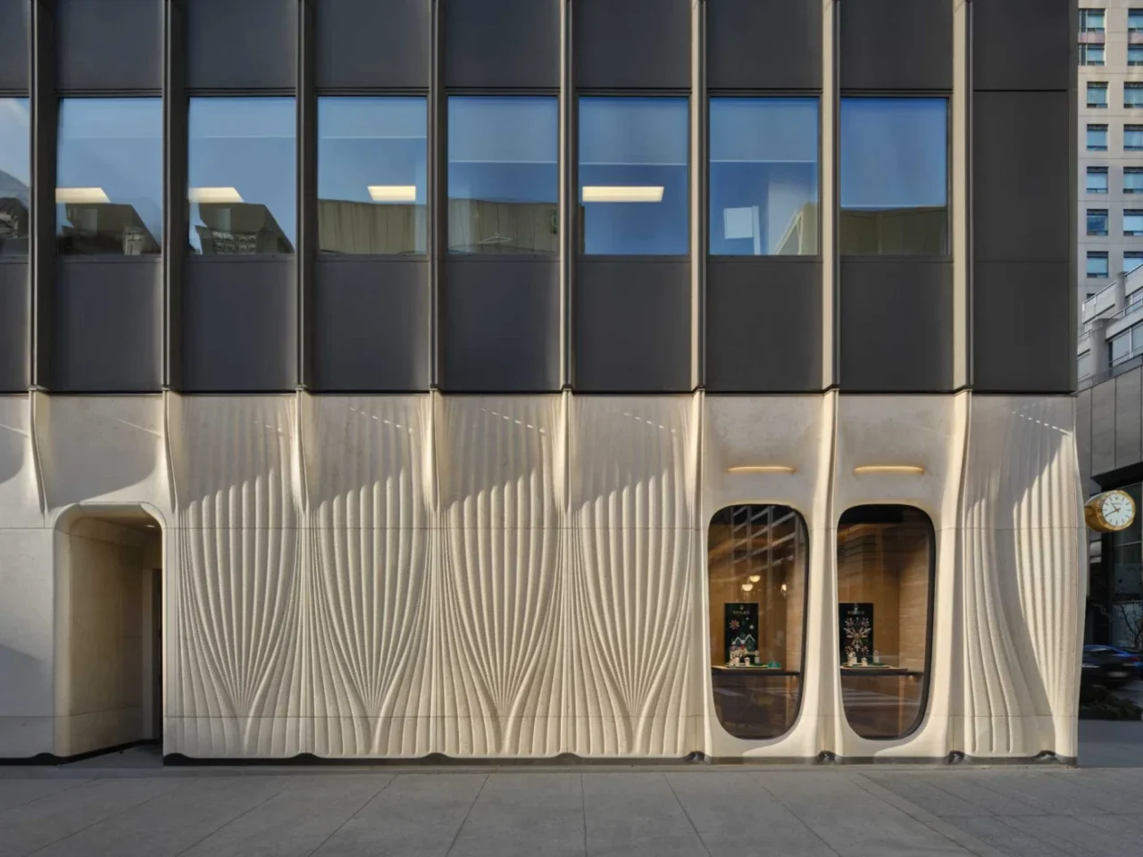 Royal de Versailles Jewellers boutique in Toronto with a sculptural limestone facade by PARTISANS