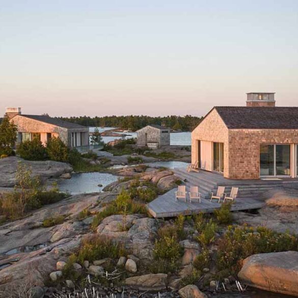 a-cluster-of-shingle-clad-buildings-create-an-island-cottage-experience-for-these-owners