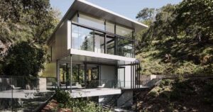 this-modern-home-is-suspended-over-a-creek