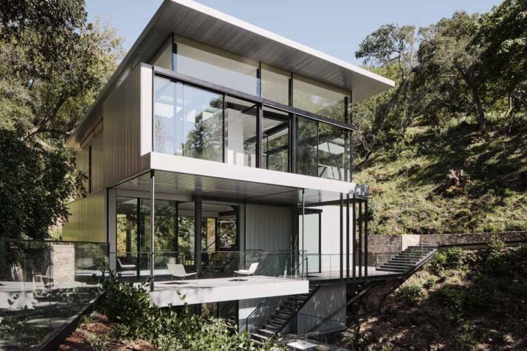 this-modern-home-is-suspended-over-a-creek