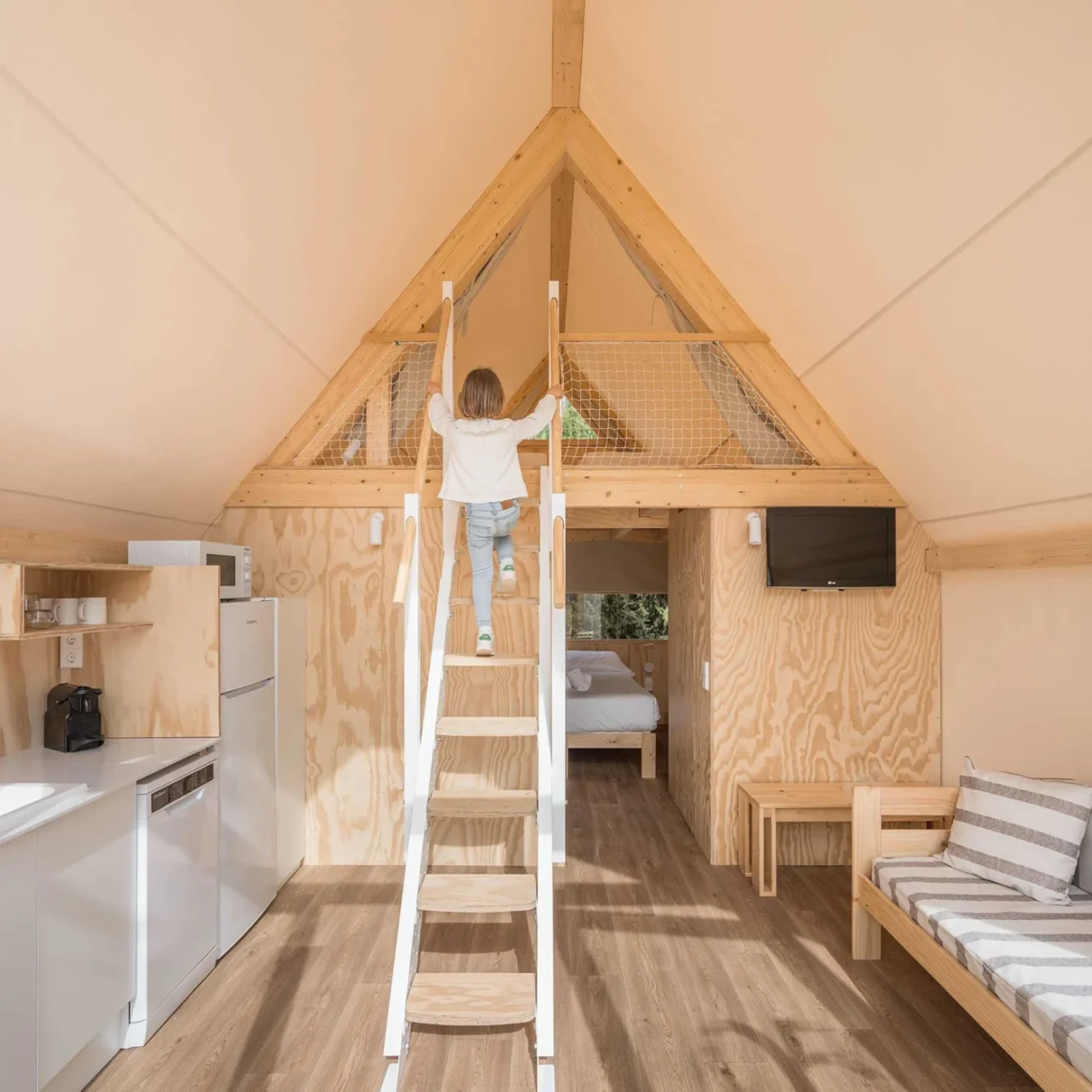 Living room and kitchen inside the TipiTop tent