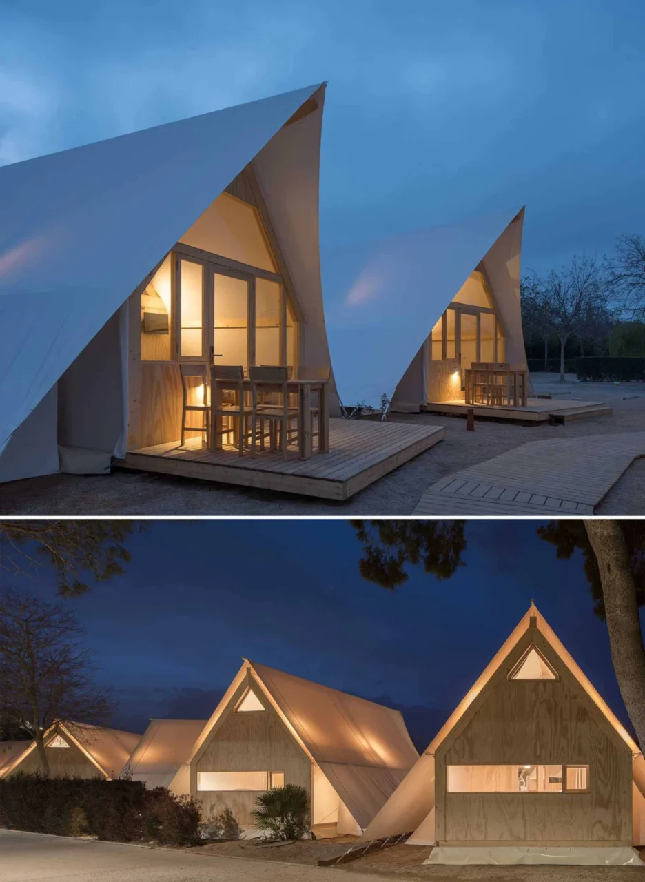 TipiTop tents lit up like lanterns at night