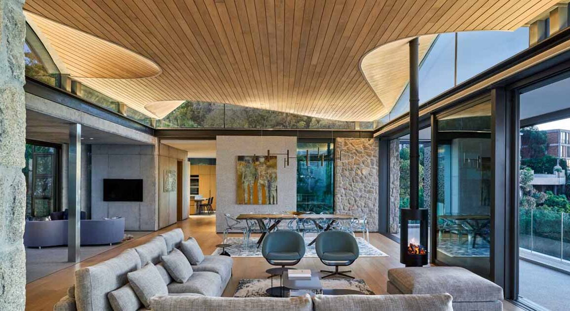 an-undulating-wood-ceiling-inspired-by-ocean-waves-and-nearby-mountains