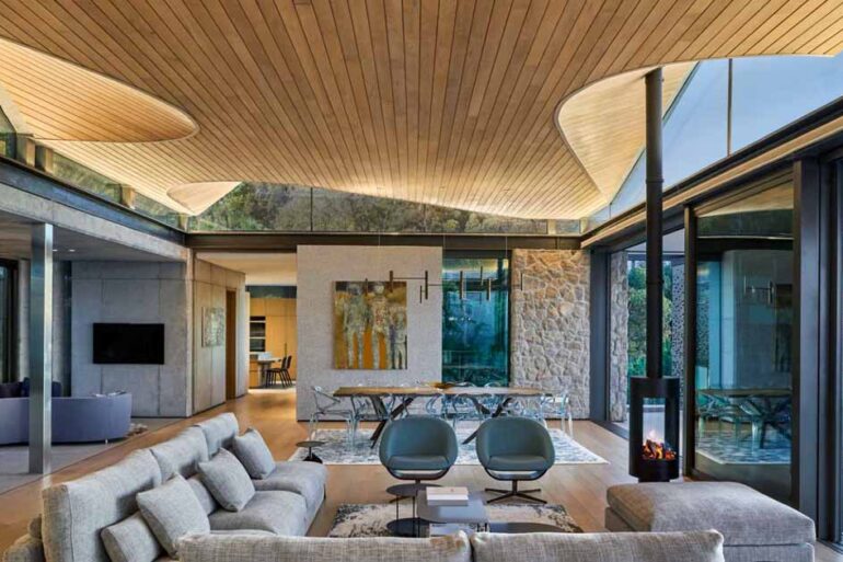 an-undulating-wood-ceiling-inspired-by-ocean-waves-and-nearby-mountains