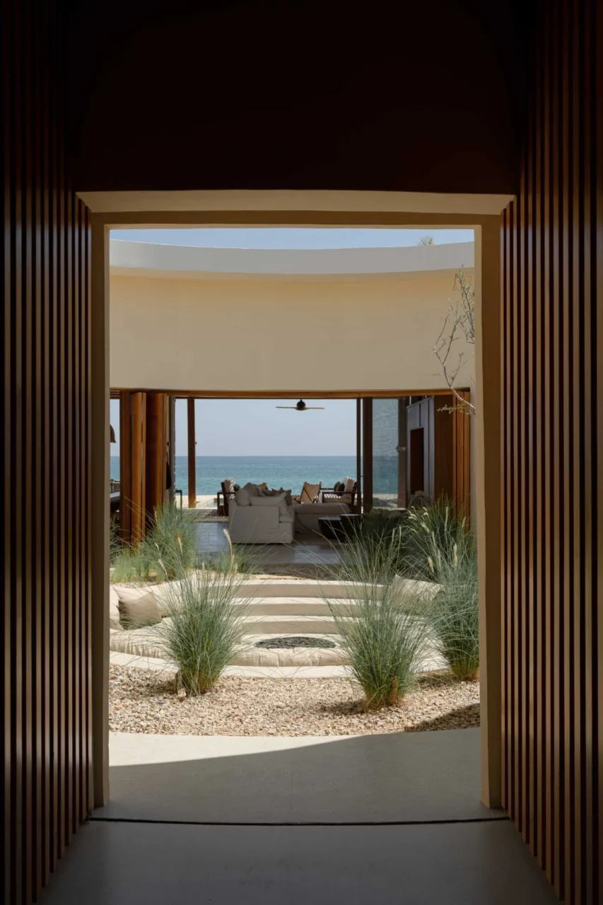 Circular courtyard with a fire pit and sunken round sofa