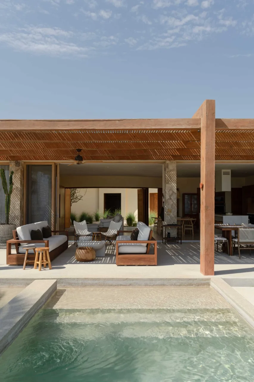 Beach terrace with concrete cube forms for the pool and jacuzzi