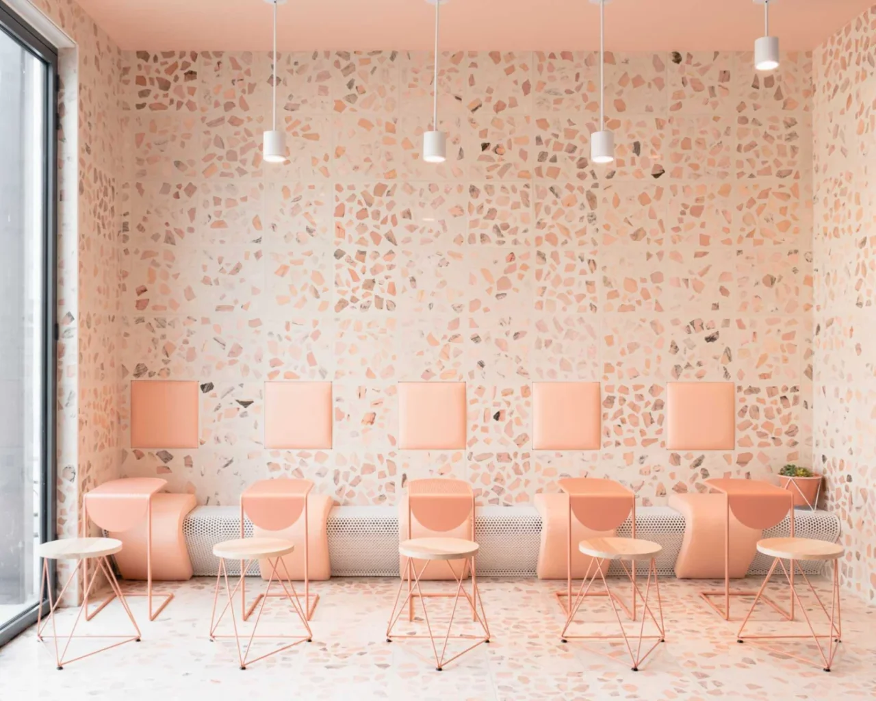 Onyx Coffee Lab at the Momentary in Bentonville, Arkansas, with custom pink terrazzo tiles