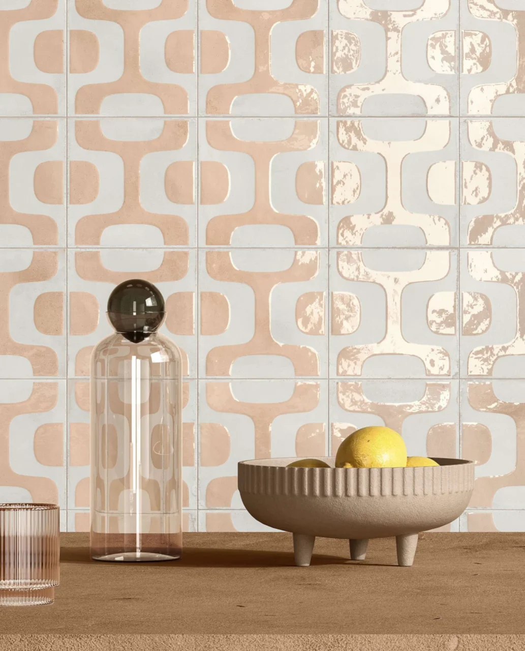 Peach-pink wall tiles with soft curves in mixed matte and glossy finishes that play with light