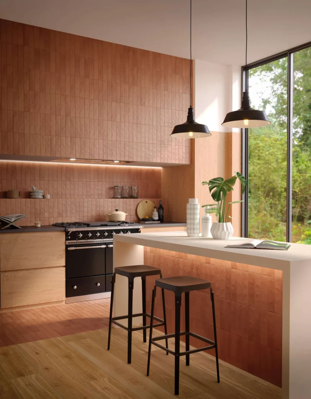 Kitchen clad in terracotta-toned tiles with matte black accents and wood