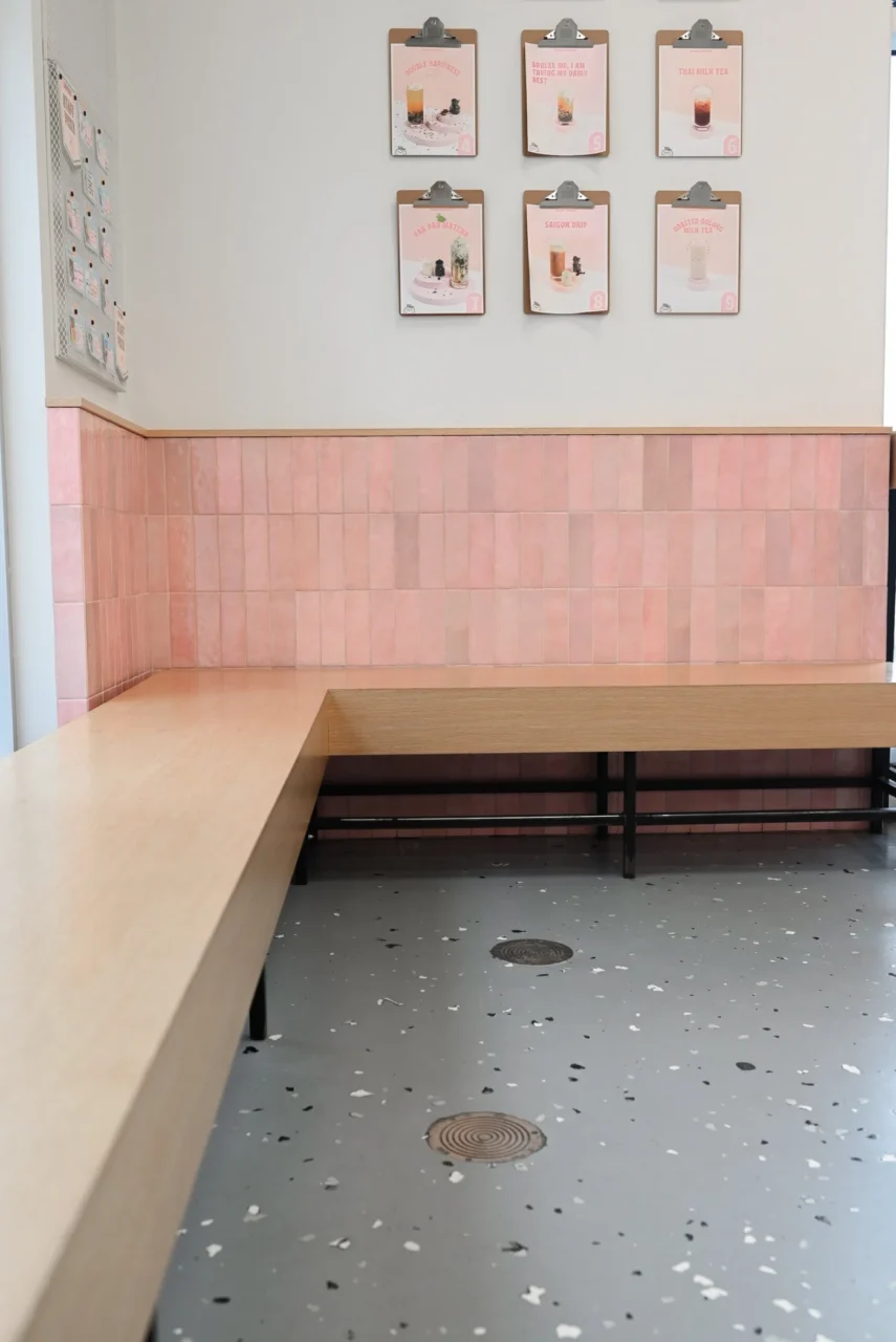 Another view of the pink tiles, cartoon basketballs and pastel graphics in the shop