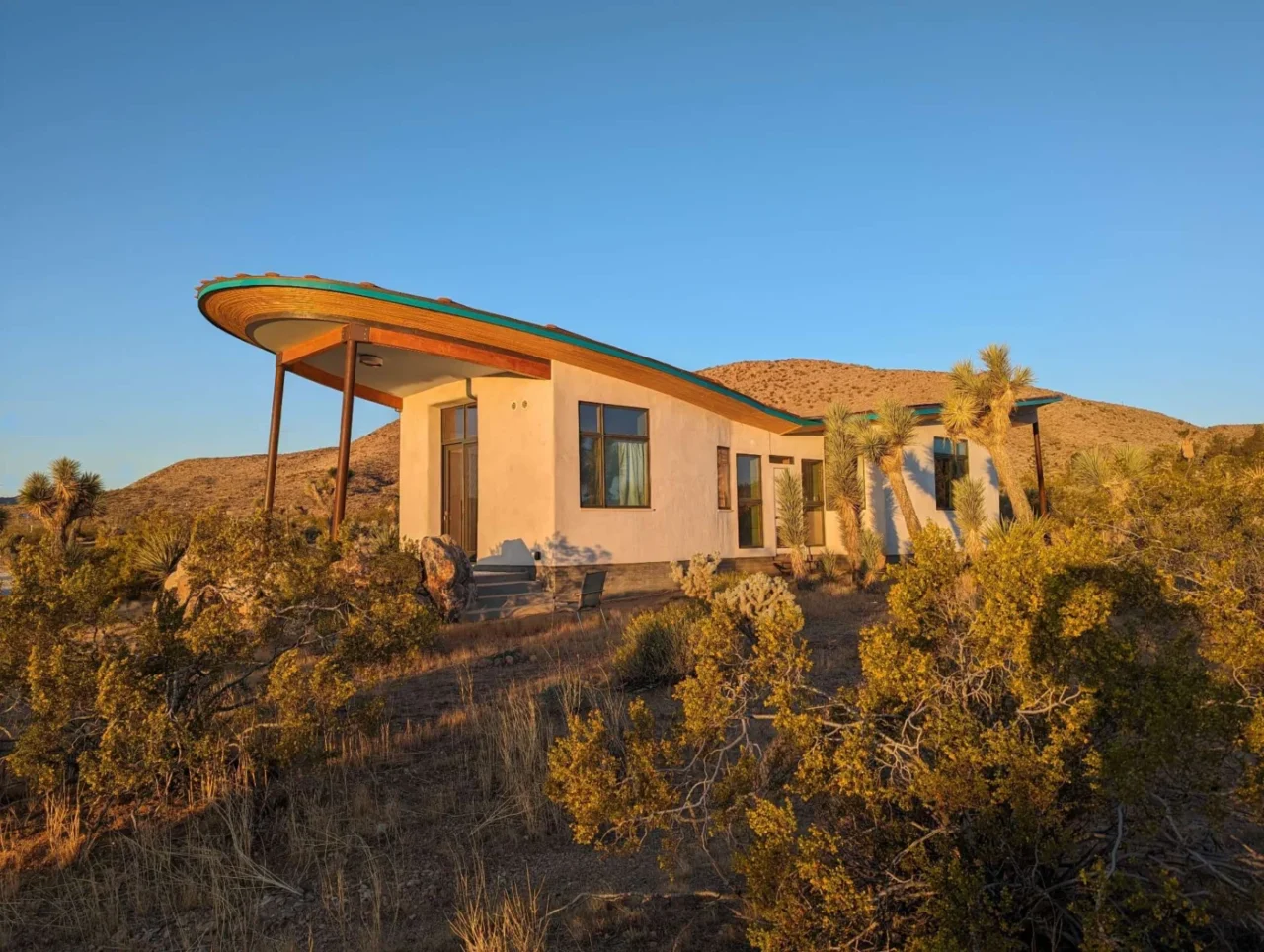 Butterfly roof of the off-grid strawbale cabin in the desert