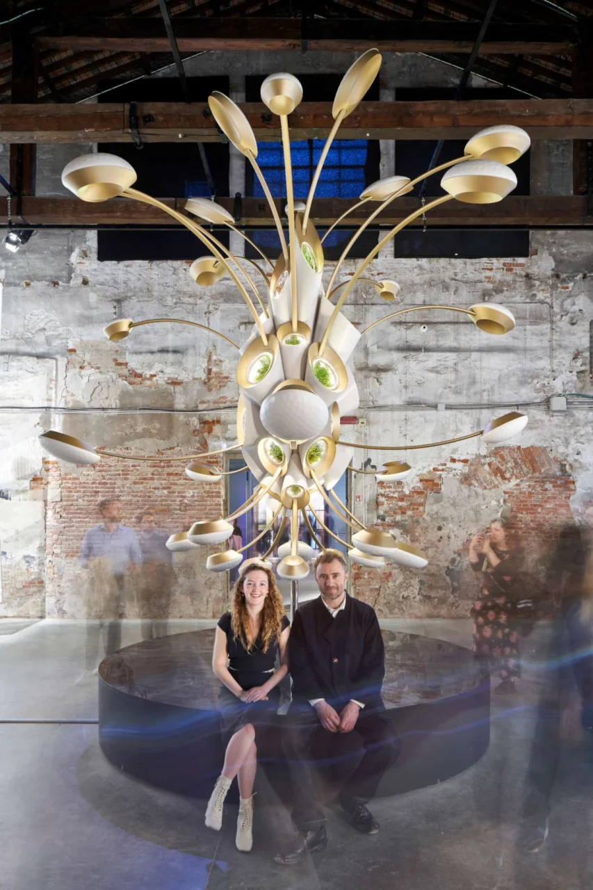 Ariel Ekblaw of Aurelia Institute and Thomas Heatherwick seated beneath the Space Garden model