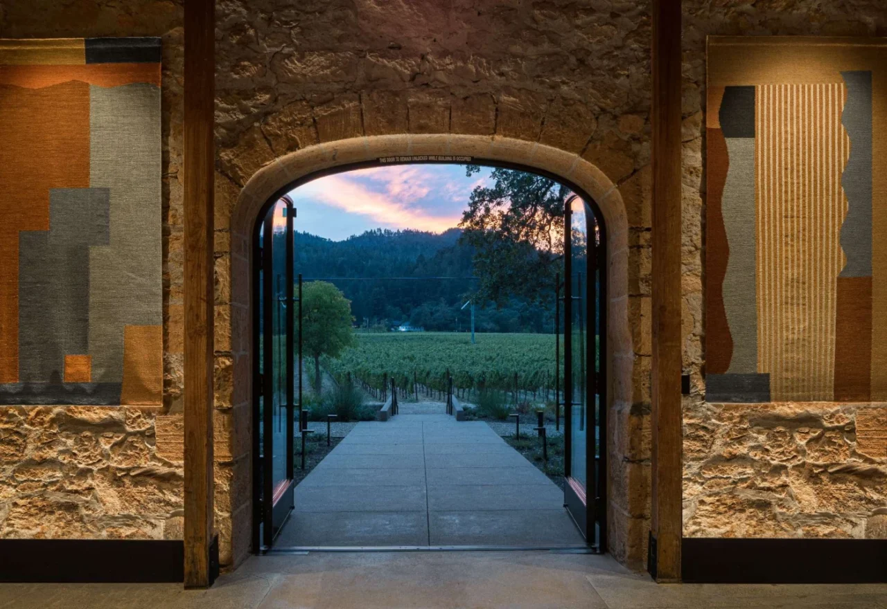 Custom steel doors and windows set into the historic stone walls