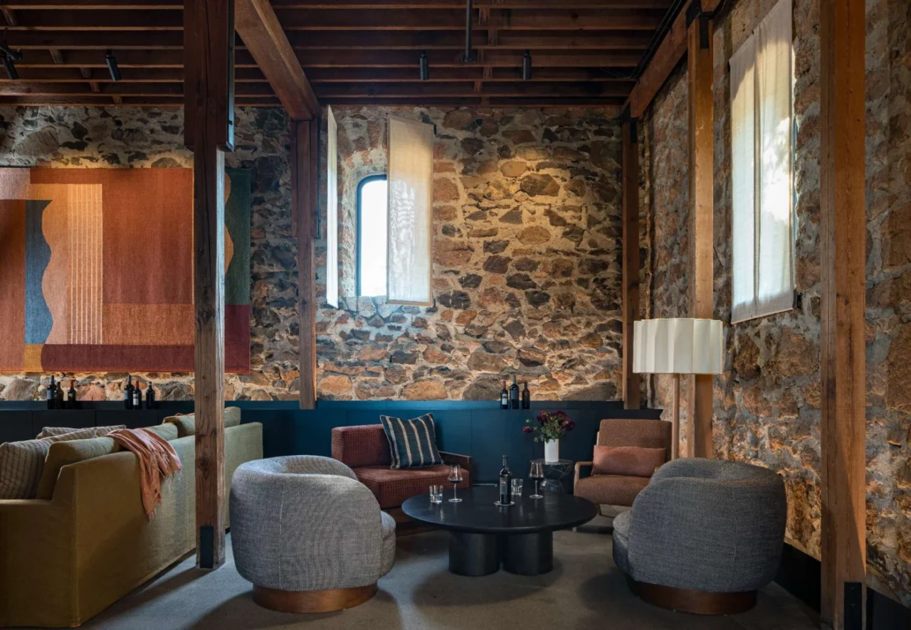 Sheer fabric shutters softening the southern light in the tasting room