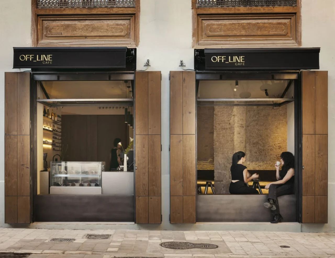 OFF LINE Café by Ramón Esteve Estudio on a corner of an old building in El Carmen, Valencia