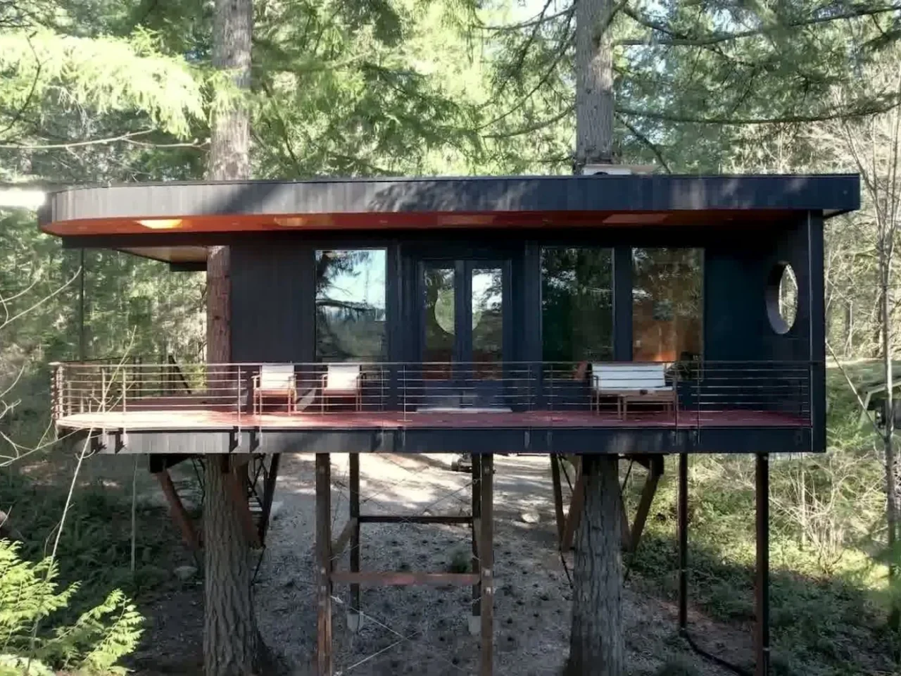 Black Crane Treehouse, a mid century inspired artist retreat in the trees above Mission Lake, Washington