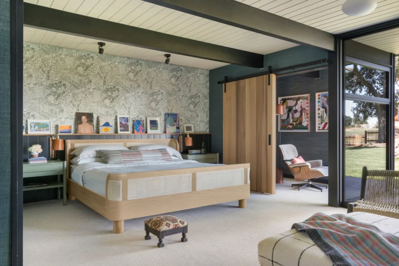 Primary suite with a cedar display ledge and sliding barn door