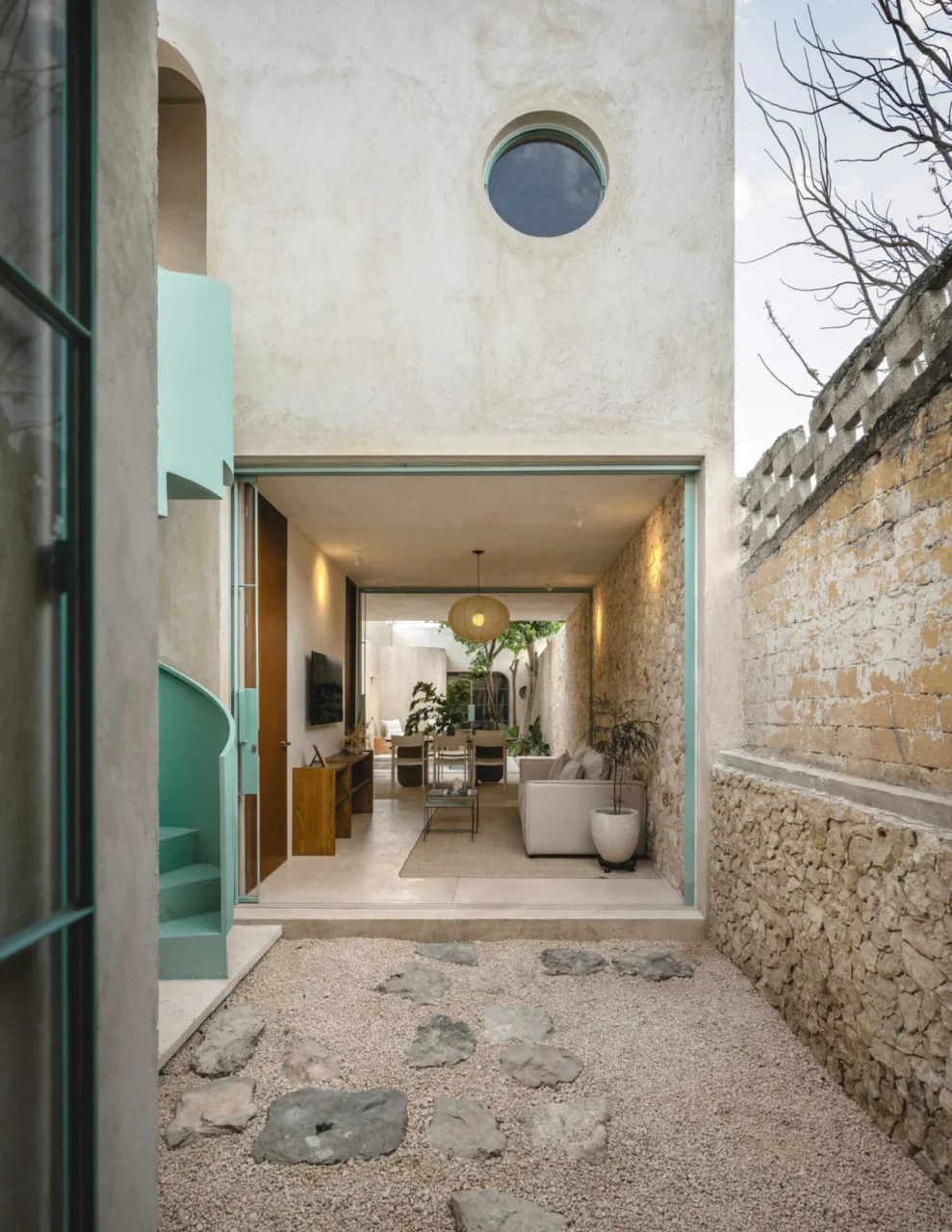 Living and dining area connected to a central patio