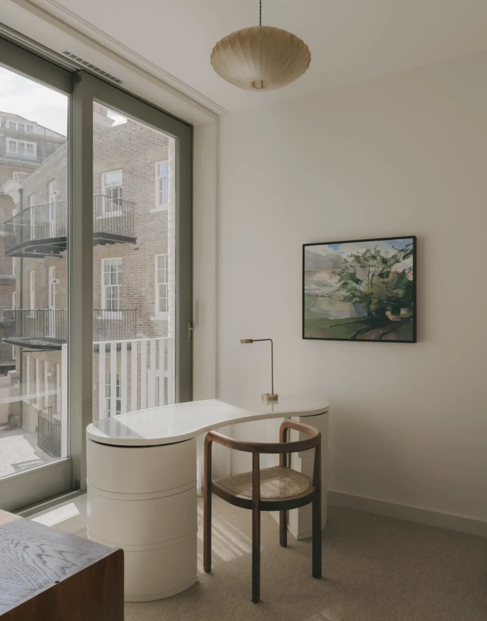 Apartment interior with solid oak flooring and off-white lacquered joinery
