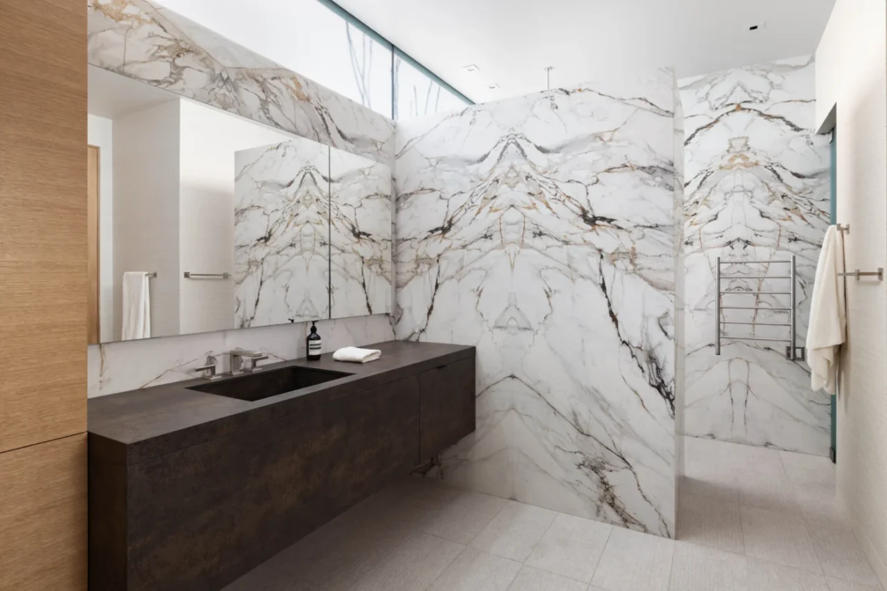 Bathroom in stone and glass with natural light