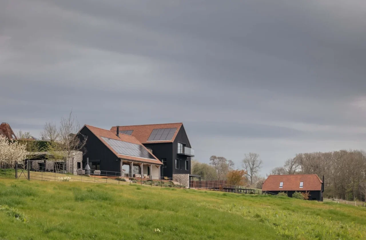 Downland Barns, a barn-inspired family home by McLean Quinlan in the North Downs, England