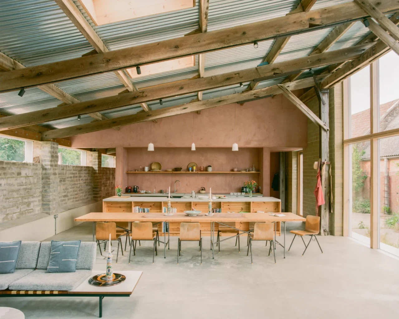 Cast concrete benches and worktops with light timber finishes