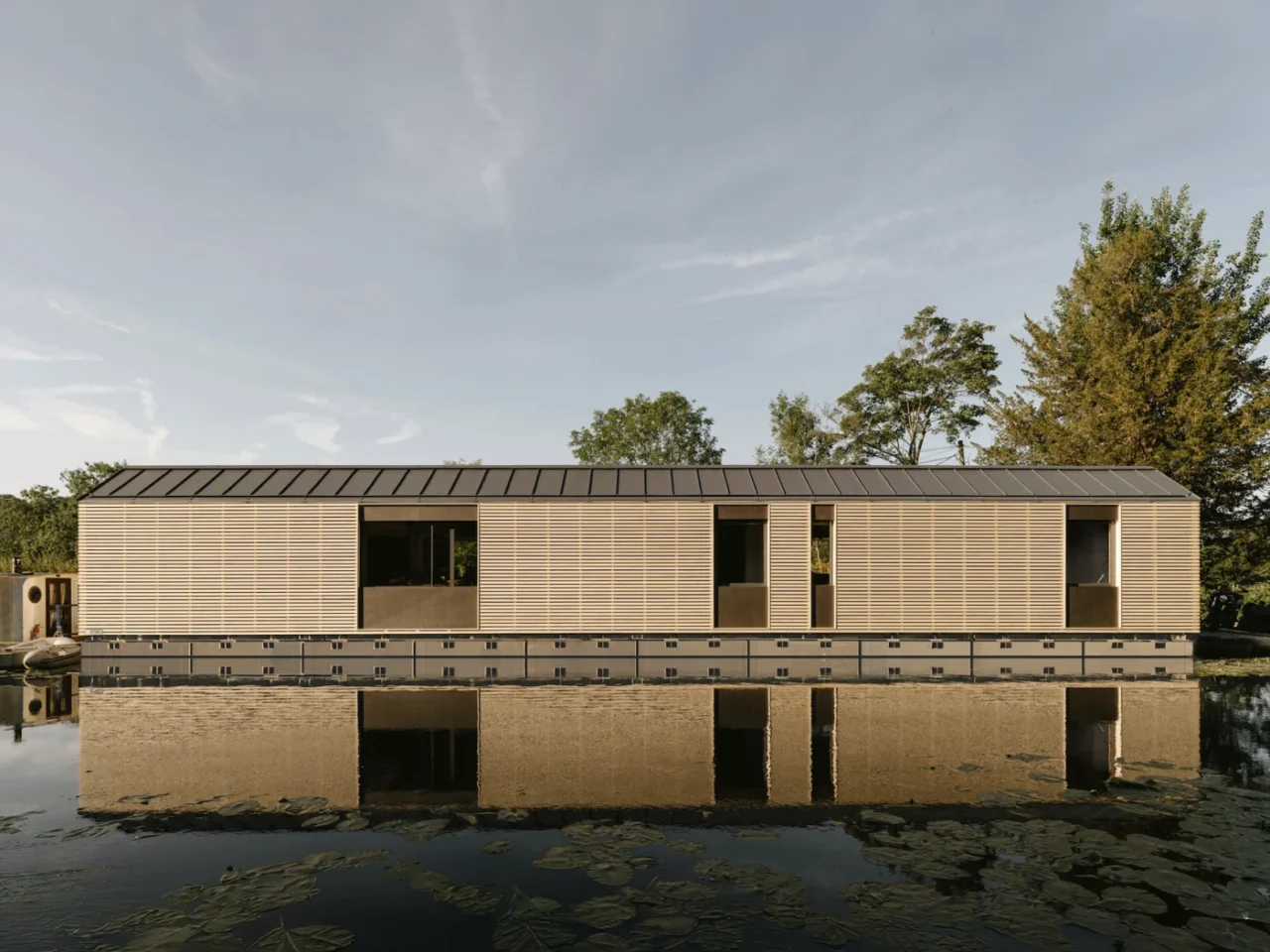 The Float House by TiggColl, a floating family home on the Grand Union Canal in Ruislip, northwest London