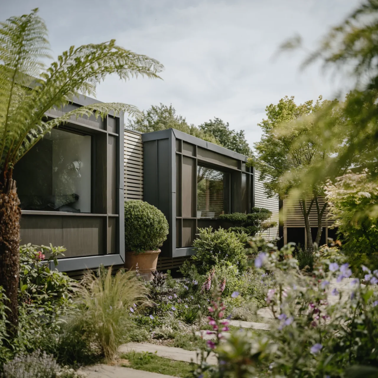 Floating home clad in horizontal timber slats
