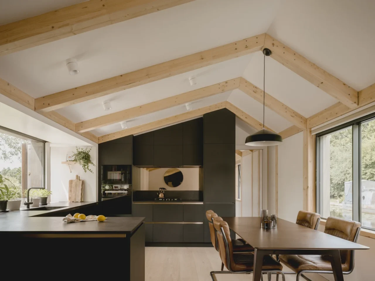 Interior of The Float House with its exposed timber frame